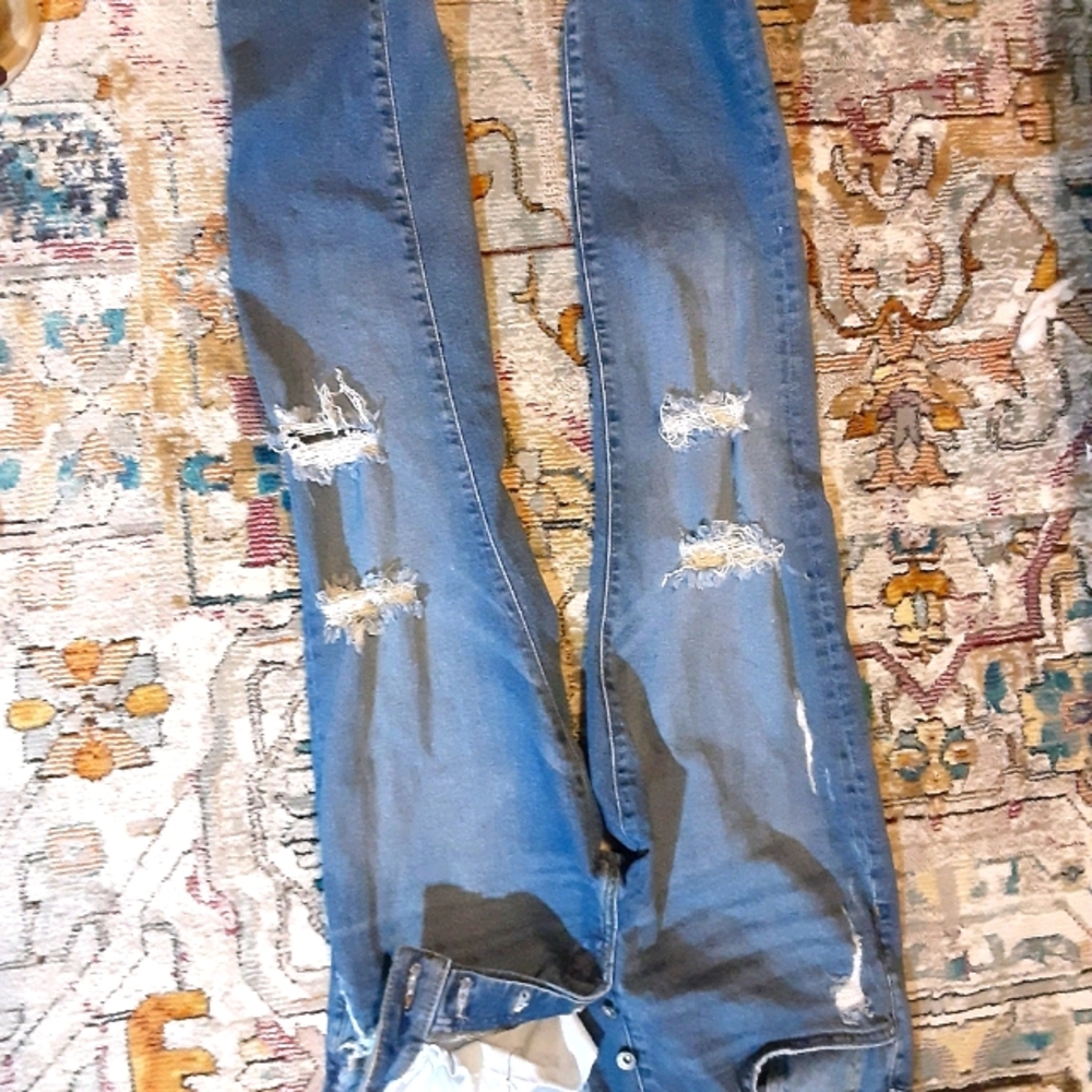 A pair of H&M blue jeans